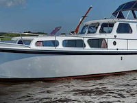 (locatie biddinghuizen) motorjacht, lauwersmeer, kruiser 1130, wit, 1982 - afbeelding 19 van  25