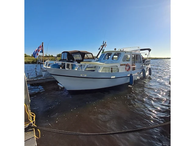 (locatie sint nicolaasga) klassieke stalen motorkruiser, "blauwe reiger", incl. boottrailer - afbeelding 1 van  154