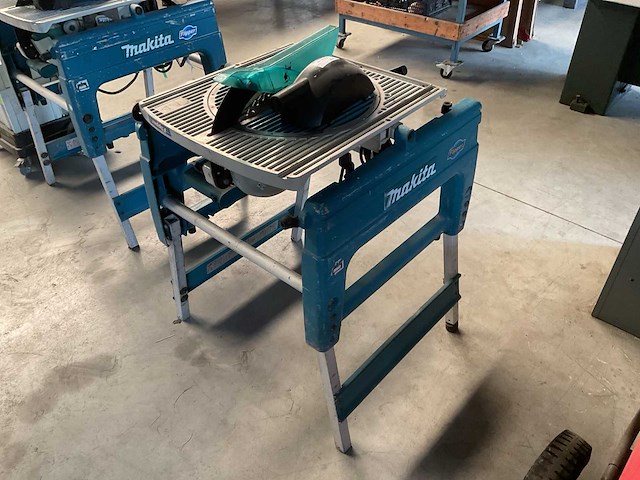 Makita lf1000 flipper afkort-/tafelcirkelzaag - afbeelding 1 van  3