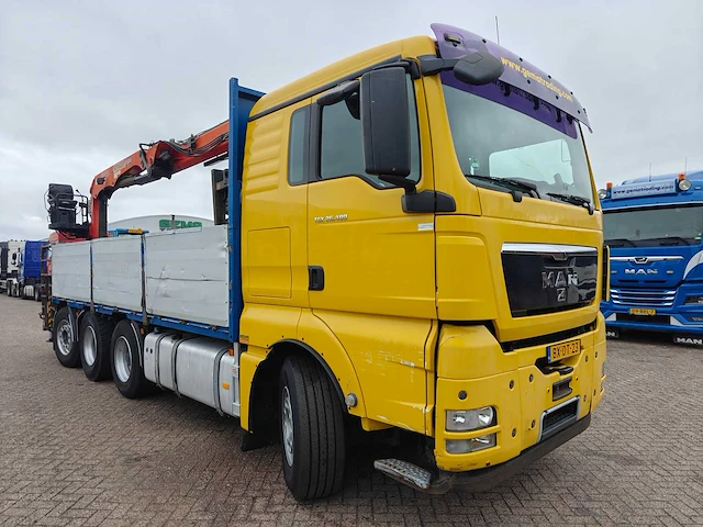Man - 2009 - tgx 26.480 8x2-6bl - vrachtwagen - afbeelding 34 van  70