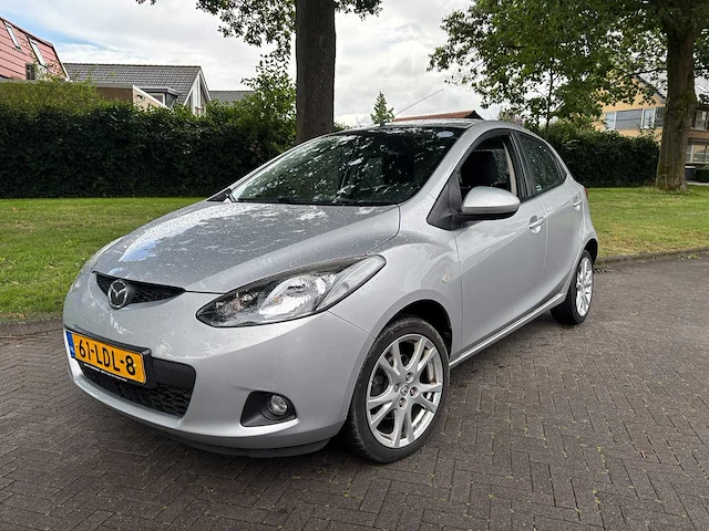 Mazda - 2 - 1.3 ts plus - 2010 - 61-ldl-8 - personenauto - afbeelding 1 van  30