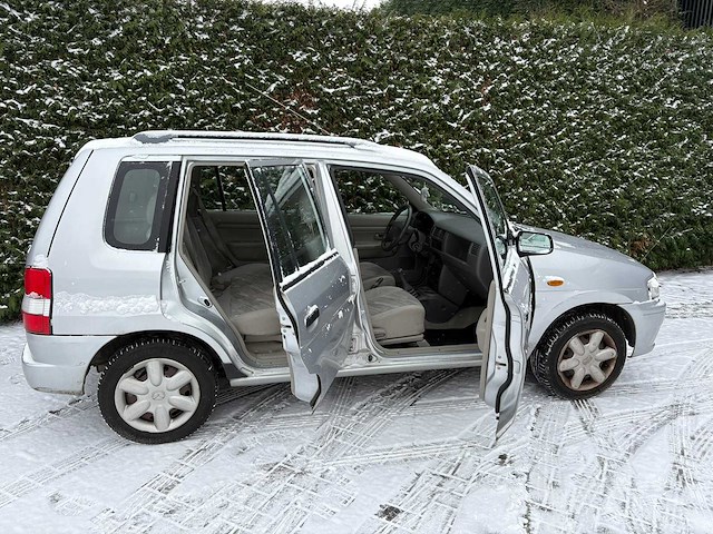 Mazda - demio - 1.3 lx - personenauto - afbeelding 11 van  26