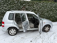 Mazda - demio - 1.3 lx - personenauto - afbeelding 11 van  26