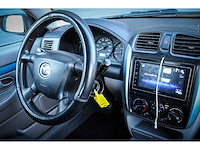 Mazda - demio - 1.5 exclusive 52-jf-fb - afbeelding 12 van  15