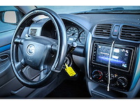 Mazda - demio - 1.5 exclusive 52-jf-fb - afbeelding 13 van  15