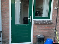 Meranti hardhouten buitendeur, hr++ glas; hoge borstwering, houtkleur, pallet e