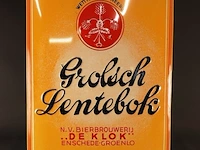 Metalen reclamebord van grolsch lentebok, uitgegeven door n.v. bierbrouwerij 'de klok' uit enschede-groenlo