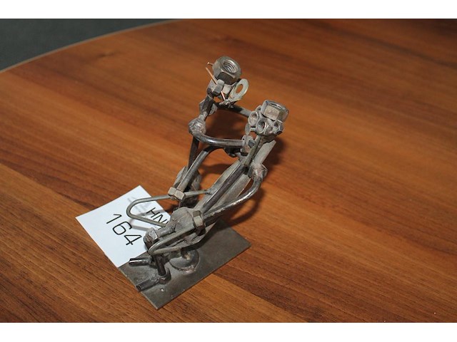 Metalen tandartsbeeldje. - afbeelding 1 van  3