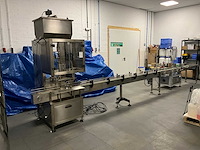 Mic flessen vul- en ettiketeerlijn