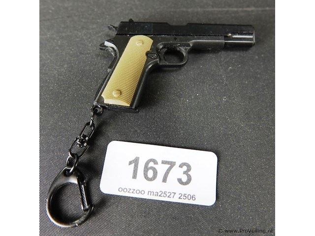 Miniatuur pistool - afbeelding 1 van  3