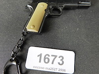 Miniatuur pistool - afbeelding 1 van  3
