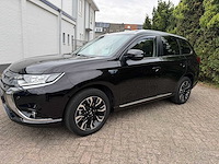 Mitsubishi - 2015 - outlander - 2.0 phev exec. ed. - personenauto - afbeelding 2 van  4