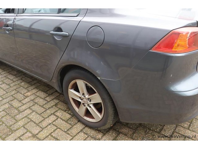 Mitsubishi lancer | benzine | kenteken: 32-ngp-1 - afbeelding 29 van  31