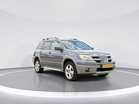 Mitsubishi outlander 2.4 intense 4wd | 75-sj-hp i - afbeelding 21 van  25