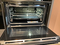 Mk carbon eiland showroomkeuken met coffeecorner en kastenwand - afbeelding 18 van  51