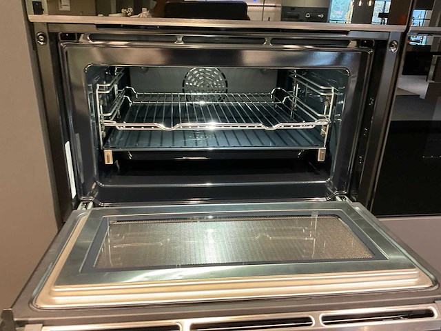 Mk carbon eiland showroomkeuken met coffeecorner en kastenwand - afbeelding 24 van  51