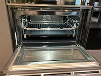 Mk carbon eiland showroomkeuken met coffeecorner en kastenwand - afbeelding 24 van  51