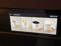 Mk carbon eiland showroomkeuken met coffeecorner en kastenwand - afbeelding 41 van  51