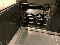 Mk classic eiland showroomkeuken met wandopstelling en inductiefornuis - afbeelding 20 van  41