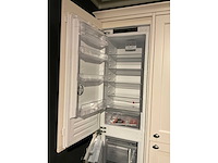 Mk classic eiland showroomkeuken met wandopstelling en inductiefornuis - afbeelding 31 van  41