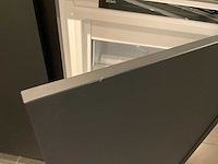 Mk memory hoekopgestelde showroomkeuken met kastenwand - afbeelding 19 van  31