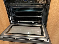 Mk natural beach eiland showroom keuken met kastenwand en coffeecorner - afbeelding 17 van  32