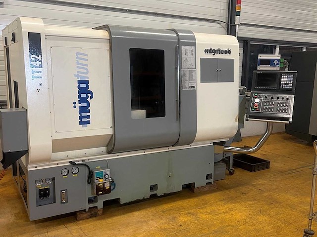 Müga - 2012 - tt-42 - cnc-draaibank met stafaanvoer - afbeelding 1 van  9