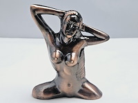 Naakte vrouw aansteker - afbeelding 1 van  4