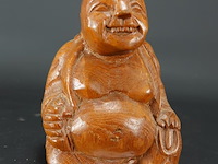 Naïef in hout gesneden happy boeddha