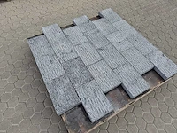 Natuursteen bestrating (ca. 57,6m2)