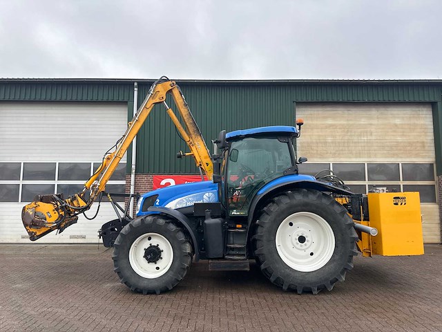 New holland - 2006 - ts125a - tractor met herder kmu180 maaier - afbeelding 1 van  10