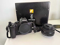 Nikon z50 systeemcamera met nikkor lens - afbeelding 1 van  11