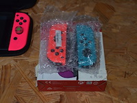 Nintendo switch model hac-001 met extra joy con en hoes - afbeelding 6 van  7