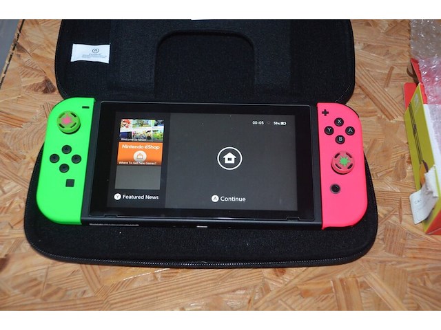 Nintendo switch model hac-001 met extra joy con en hoes - afbeelding 7 van  7