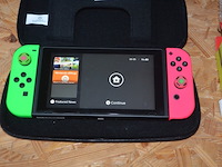 Nintendo switch model hac-001 met extra joy con en hoes - afbeelding 7 van  7