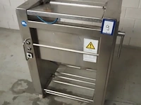 Nn skinning machine
