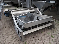 Nn vibrating gutter