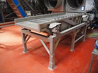 Nn vibrating gutter