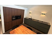 Nobilia riva/easytouch notenhout/mineraalgroen - showroom keuken