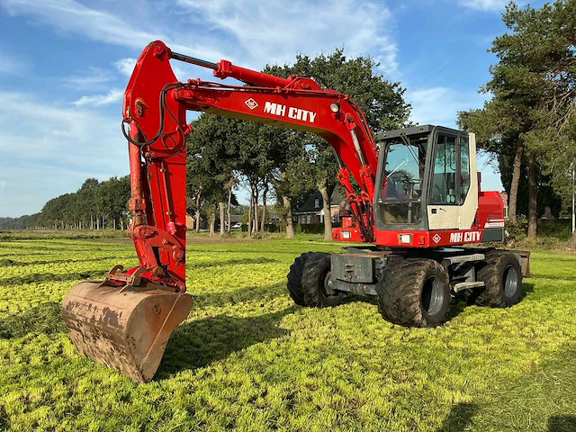 O&k mh city b banden graafmachine - afbeelding 1 van  29