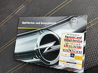Opel - 2010 - corsa - 1.4-16v cosmo - zv-484-k - afbeelding 7 van  15