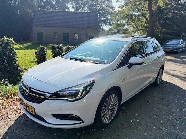Opel - astra sports tourer - 1.0 innovation - 2016 - kg-975-g - afbeelding 1 van  12