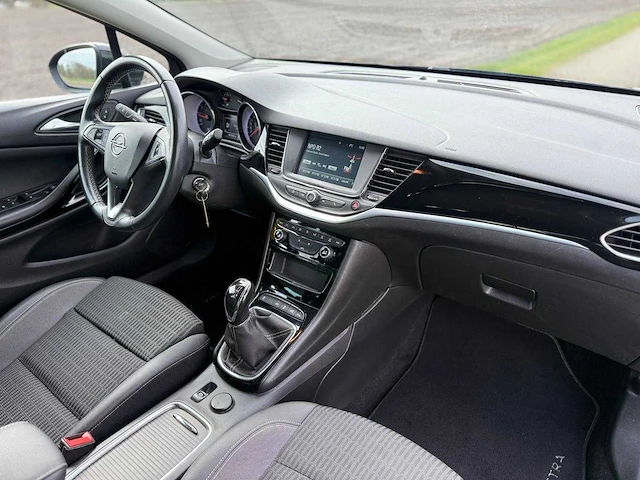 Opel - astra sports tourer - 1.2 design & tech - 2022 - p-096-jv - afbeelding 16 van  16