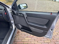 Opel astra 1.8-16v sport edition 50-jx-vv - afbeelding 12 van  14