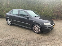 Opel astra 74-hh-gg - afbeelding 1 van  29