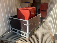 Opslagbakken en transportkarren