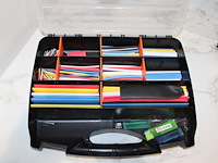 Organizers gevuld met krimpkousen.