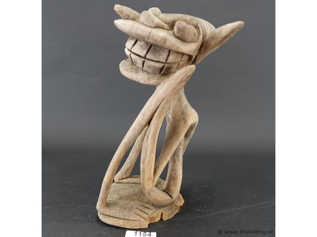 Oude afrikaanse sculptuur - afbeelding 1 van  5