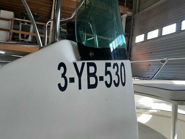 Pacific craft 630 consoleboot met trailer - afbeelding 5 van  43