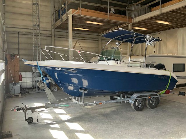 Pacific craft 630 consoleboot met trailer - afbeelding 42 van  43